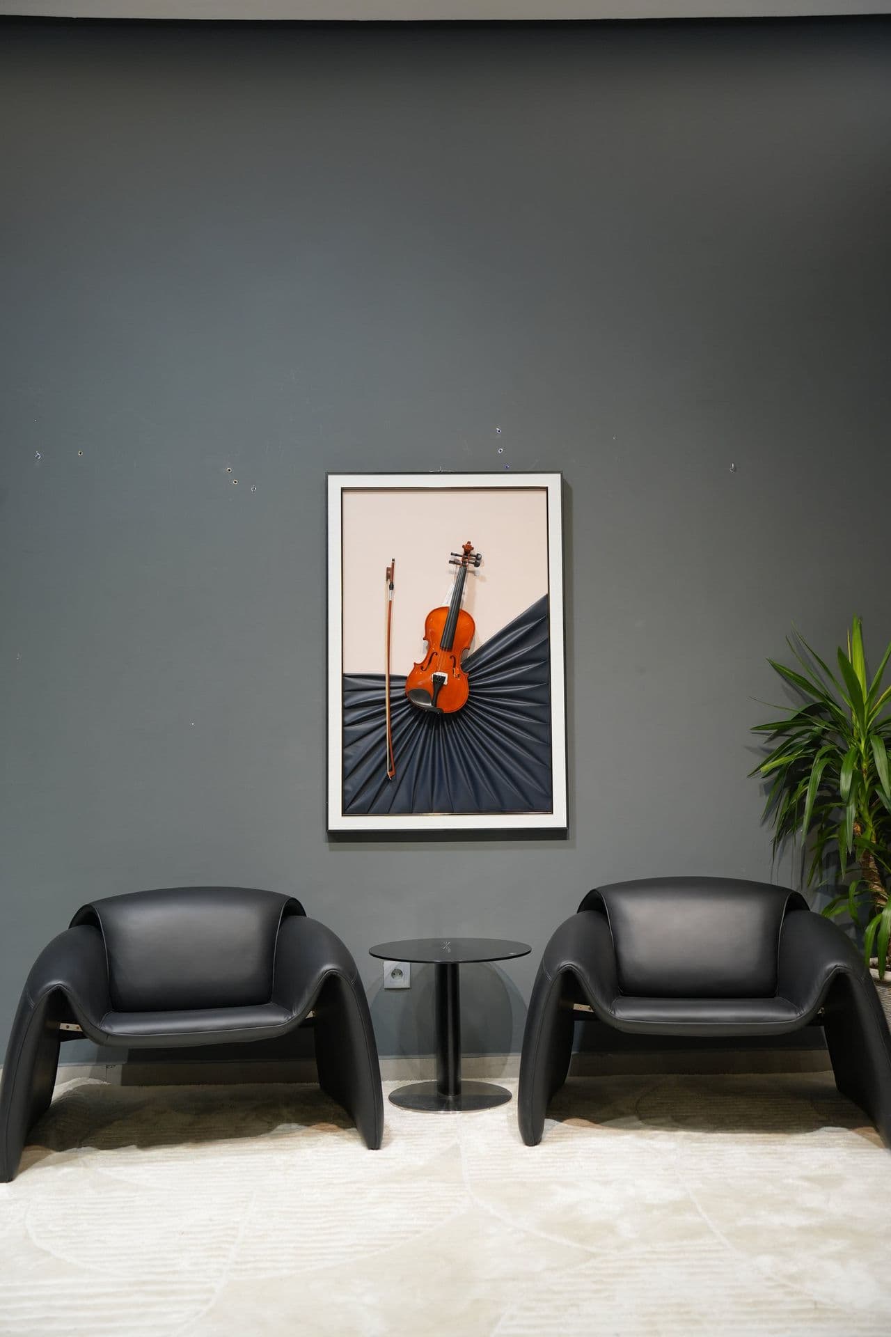 Fauteuil coque en cuir noir
